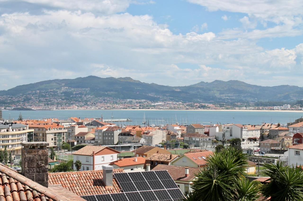 Altos De Baiona Villa Bagian luar foto